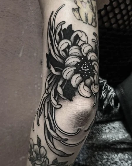 Neo-Traditional floral and Pikachu patchwork tattoo for women