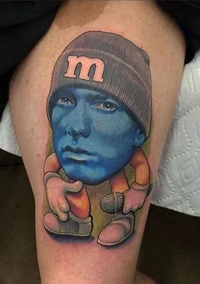 New School Realism Eminem M&M character tattoo for men on thigh