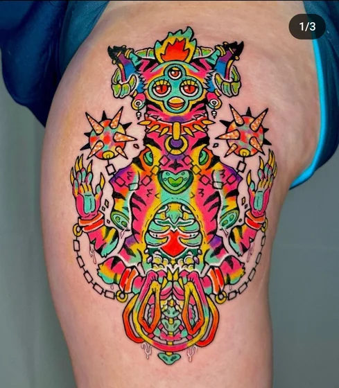 New School Trippy psychedelic creature with third eye tattoo design for women on thigh.