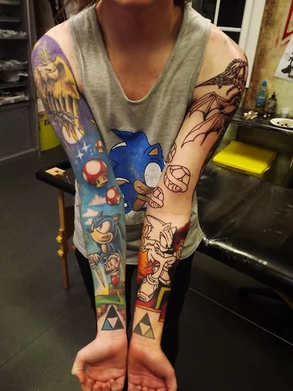 New School video game full sleeve tattoo idea for men: Sonic, Mario, Zelda
