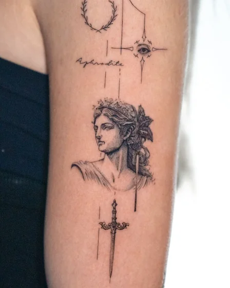 Patchwork Aphrodite bust tattoo for women on arm.