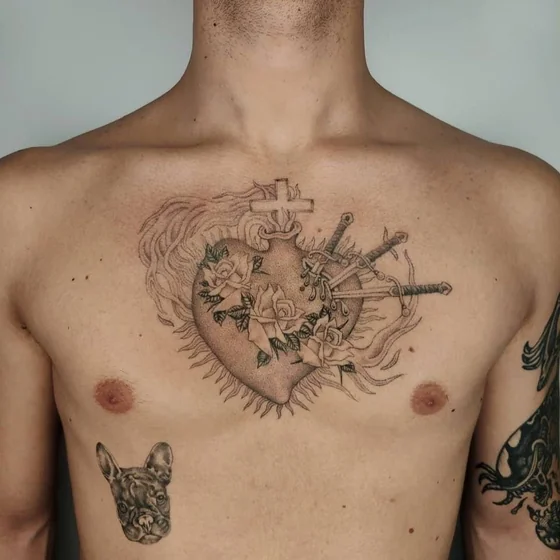 Patchwork Black and Grey Sacred Heart, roses, swords, French Bulldog tattoo idea for men on chest.