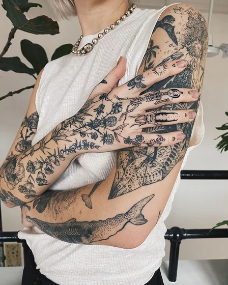 Patchwork Blackwork floral, fish tattoo for women on arm and hand