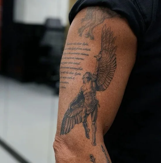 Patchwork Realistic Saint Michael Angel tattoo design for men on upper arm
