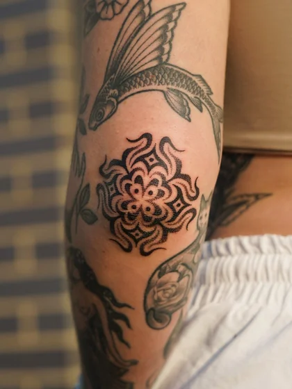 Patchwork Traditional floral, fish, rose tattoo design for women.