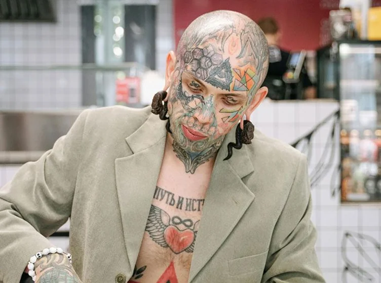 Patchwork and Geometric tattoo design for men on face and chest tattoo ideas.