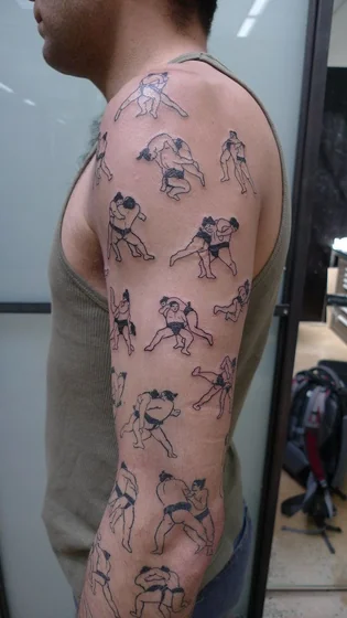 Patchwork linework sumo wrestler tattoo design for men on upper arm and forearm