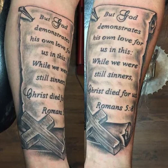 Realistic Black And Grey Cross and Quote tattoo for men on forearm