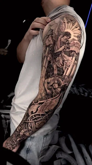 Realistic Black And Grey Saint Michael and Demon full sleeve tattoo design for men.