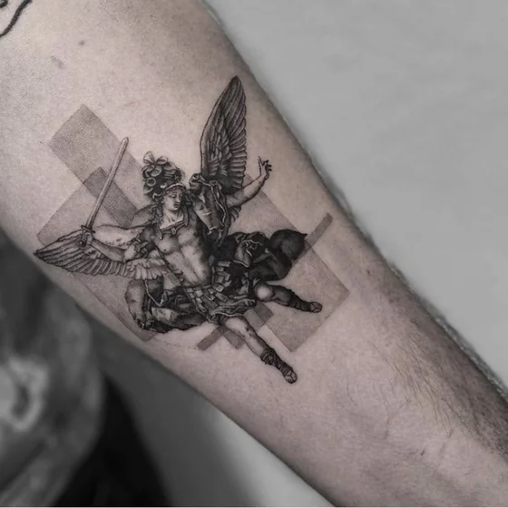 Realistic Black And Grey Saint Michael tattoo for men on forearm