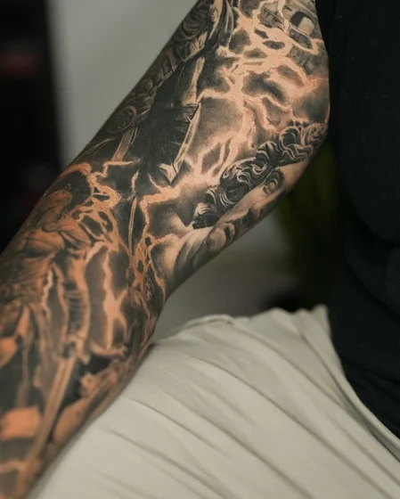 Realistic Black And Grey mythological lightning full sleeve tattoo