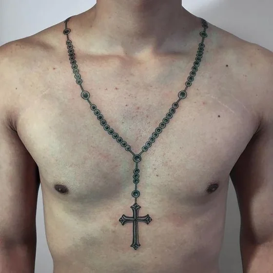 Realistic Black and Grey Rosary Cross tattoo for men on Chest and Sternum