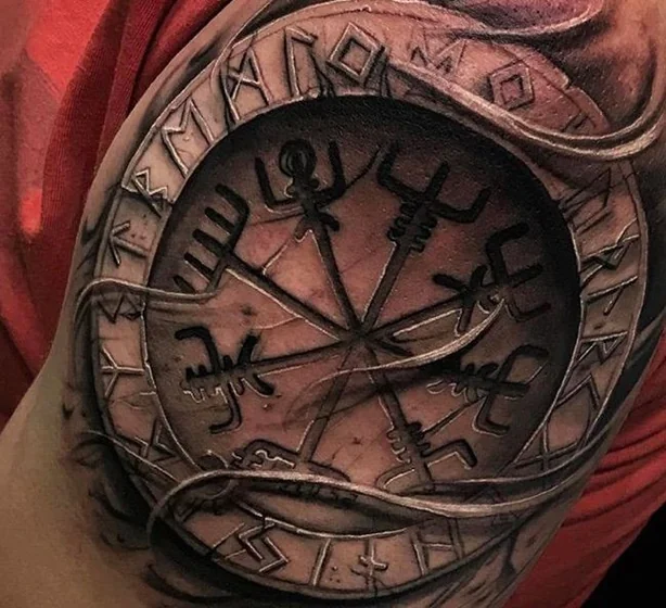 Realistic Black and Grey Viking Vegvisir compass tattoo design for men on upper arm