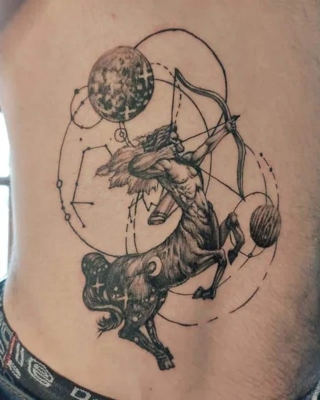 Realistic Sagittarius, moon, star tattoo design for men on rib