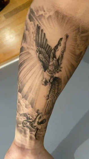 Realistic Saint Michael religious tattoo for men on forearm