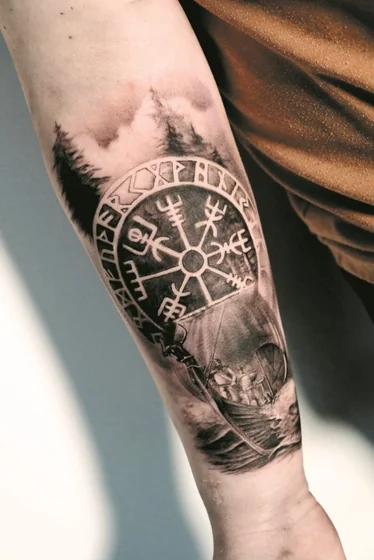 Realistic Viking compass and longship tattoo for men forearm