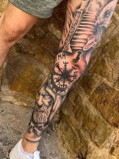 Realistic Viking, eagle, compass tattoo idea for men on calf