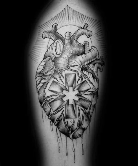 Realistic anatomical heart RHCP logo tattoo design for men