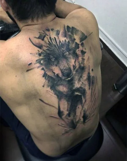 Realistic and sketch style wolf tattoo design for men on back