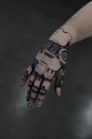 Realistic biomechanical mechanical parts tattoo for men on hand.