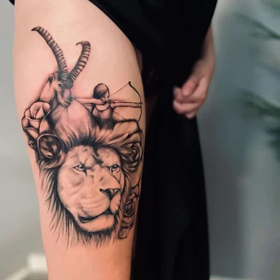 Realistic black and grey lion, zodiac tattoo for women on thigh