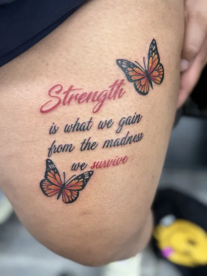 Realistic butterfly and script quote tattoo idea for women on thigh