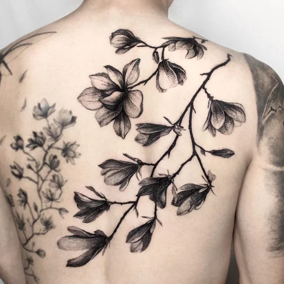 Realistic dotwork floral tattoo design for men on back