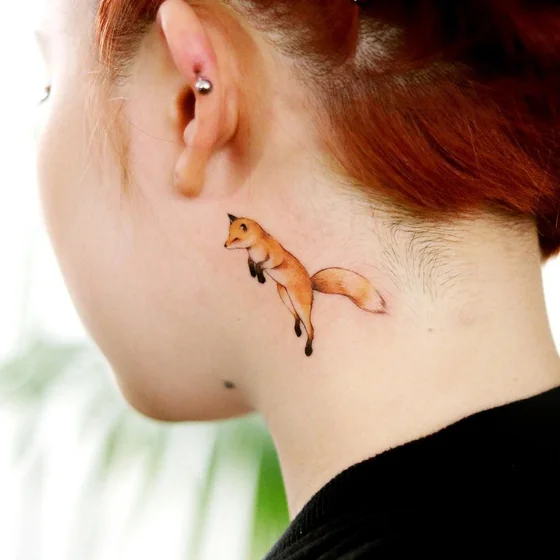 Realistic fine line fox tattoo idea for women on neck behind ear