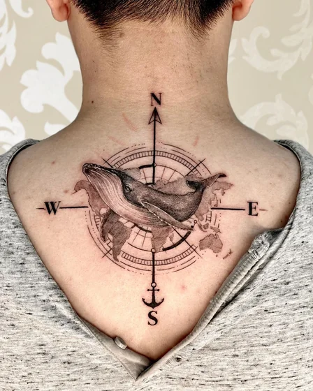 Realistic fine line whale, compass, anchor, map tattoo design for men on back