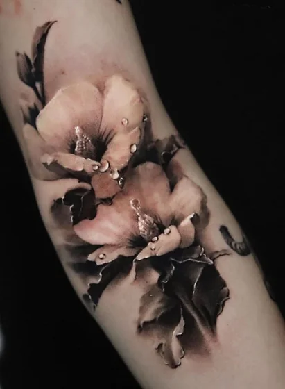 Realistic flower floral tattoo design for women on forearm