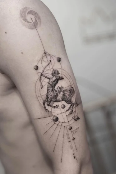 Realistic geometric Sagittarius space tattoo design for men on upper arm