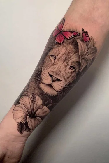 Realistic lion, butterfly, flower tattoo design for women on forearm