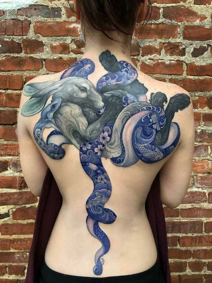 Realistic rabbit and Japanese floral snake tattoo design for women on back