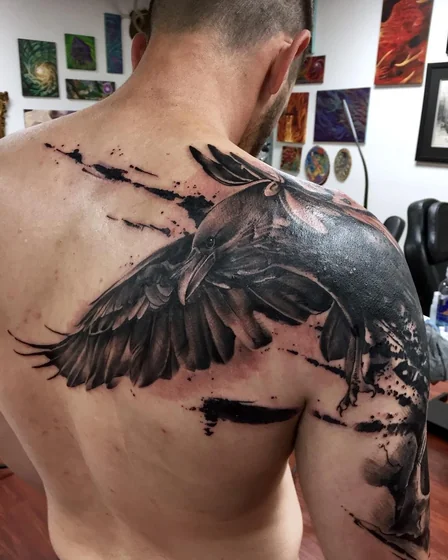 Realistic raven and abstract tattoo for men on shoulder back