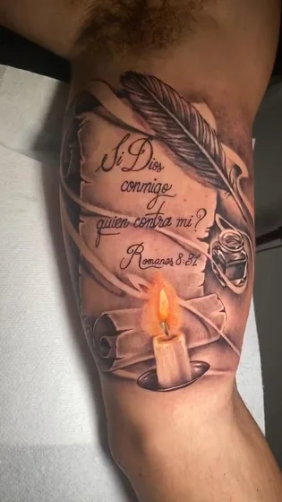 Realistic religious quote, feather, candle tattoo idea for men on upper arm