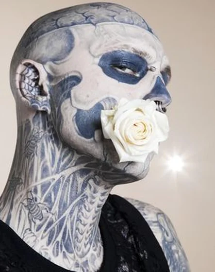 Realistic skull and bee tattoo idea for men on face and neck