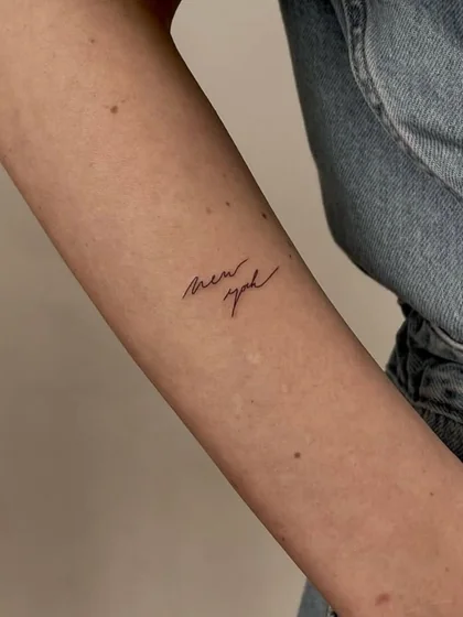 Script and Fine Line 'new york' word tattoo idea for women on forearm