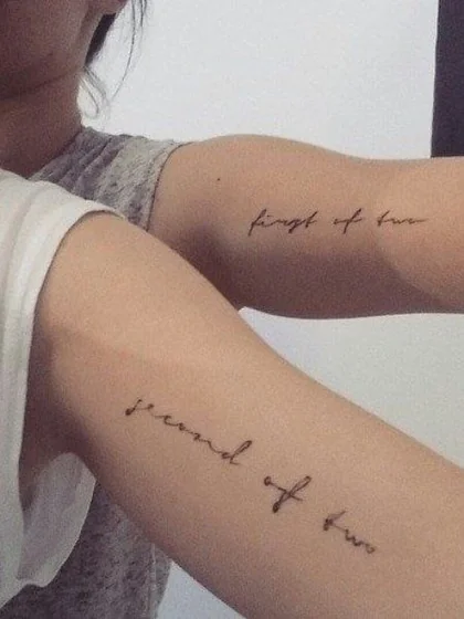 Script and Fine Line word tattoo idea for women on Upper Arm