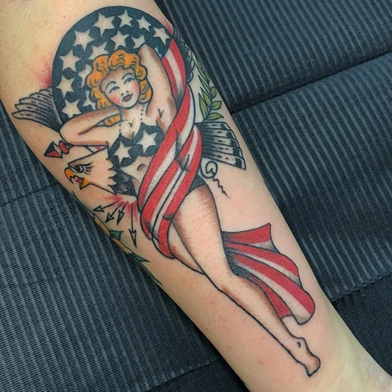 Traditional American Flag, Eagle, Pin-up Girl tattoo on forearm for women