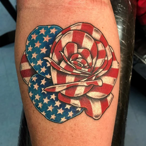 Traditional American Flag rose tattoo design for men on forearm