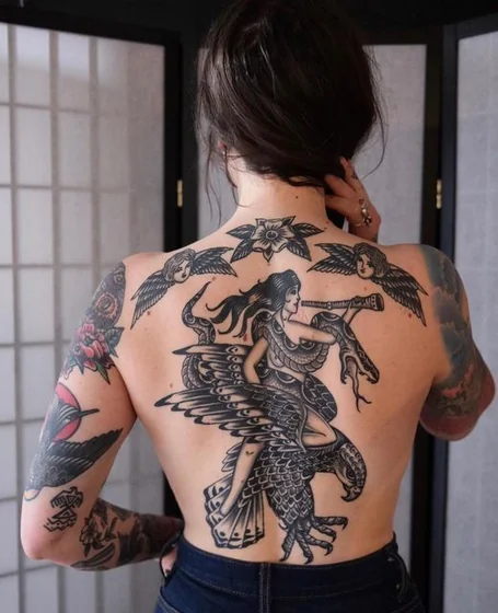 Traditional eagle, snake, angel tattoo for women on back