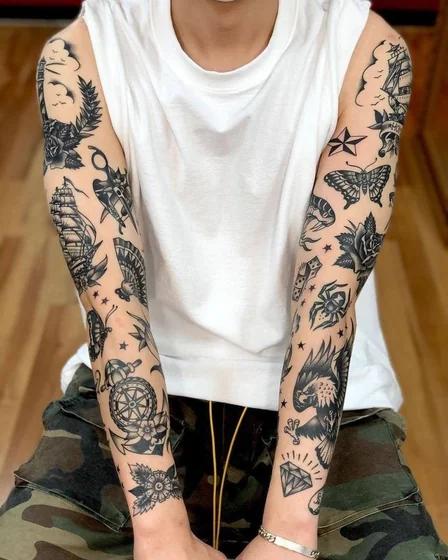 Traditional patchwork arm tattoo design for men with rose, eagle.
