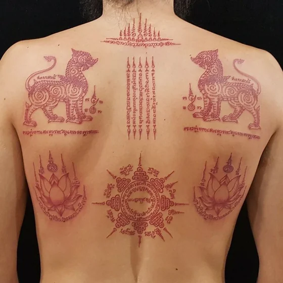 Traditional patchwork lion and lotus tattoo design for men on back