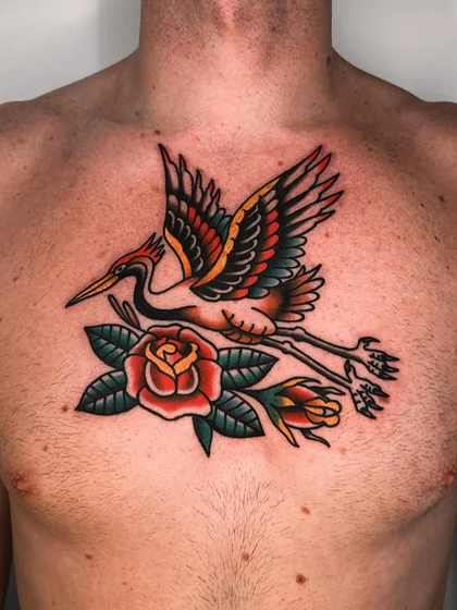 Traditional rose and bird tattoo design for men on chest