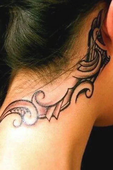 Tribal Blackwork tattoo idea for women on neck and behind the ear