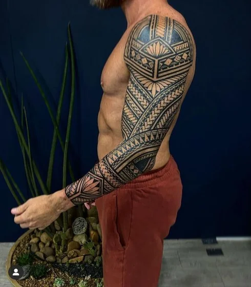 Tribal Geometric Patterns Full Sleeve tattoo design for men on arm