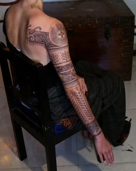 Tribal fine line sun, nature, ocean full sleeve tattoo design for women