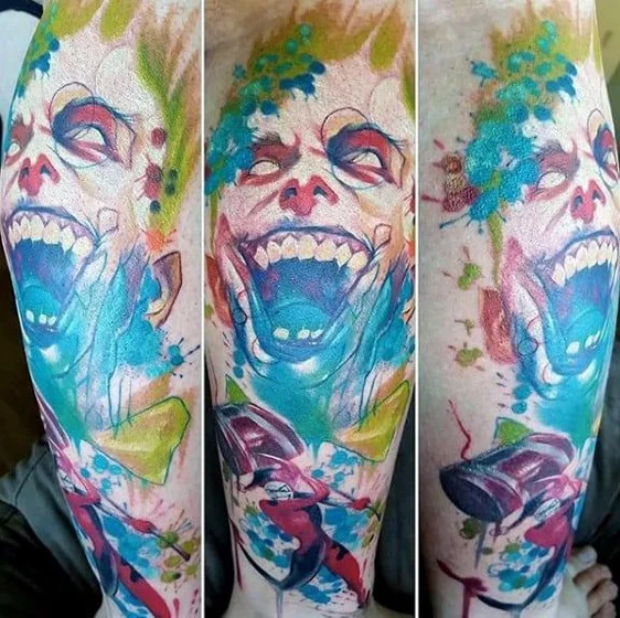 Watercolor New School Joker and Harley Quinn tattoo design for men on leg