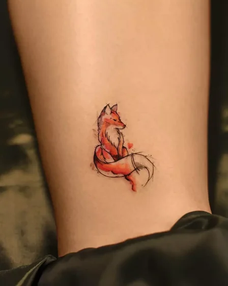 Watercolor sketch fox and heart tattoo for women on calf